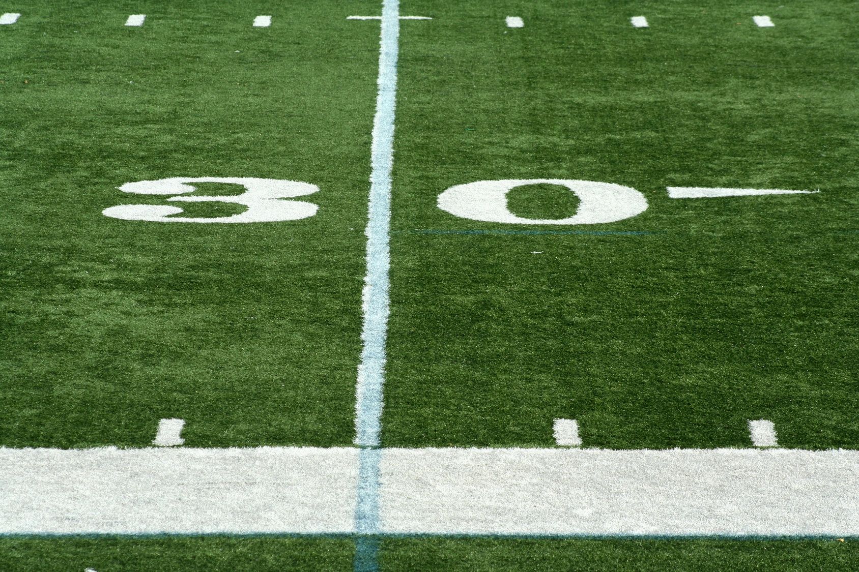picture of the 30 yard line on a football field